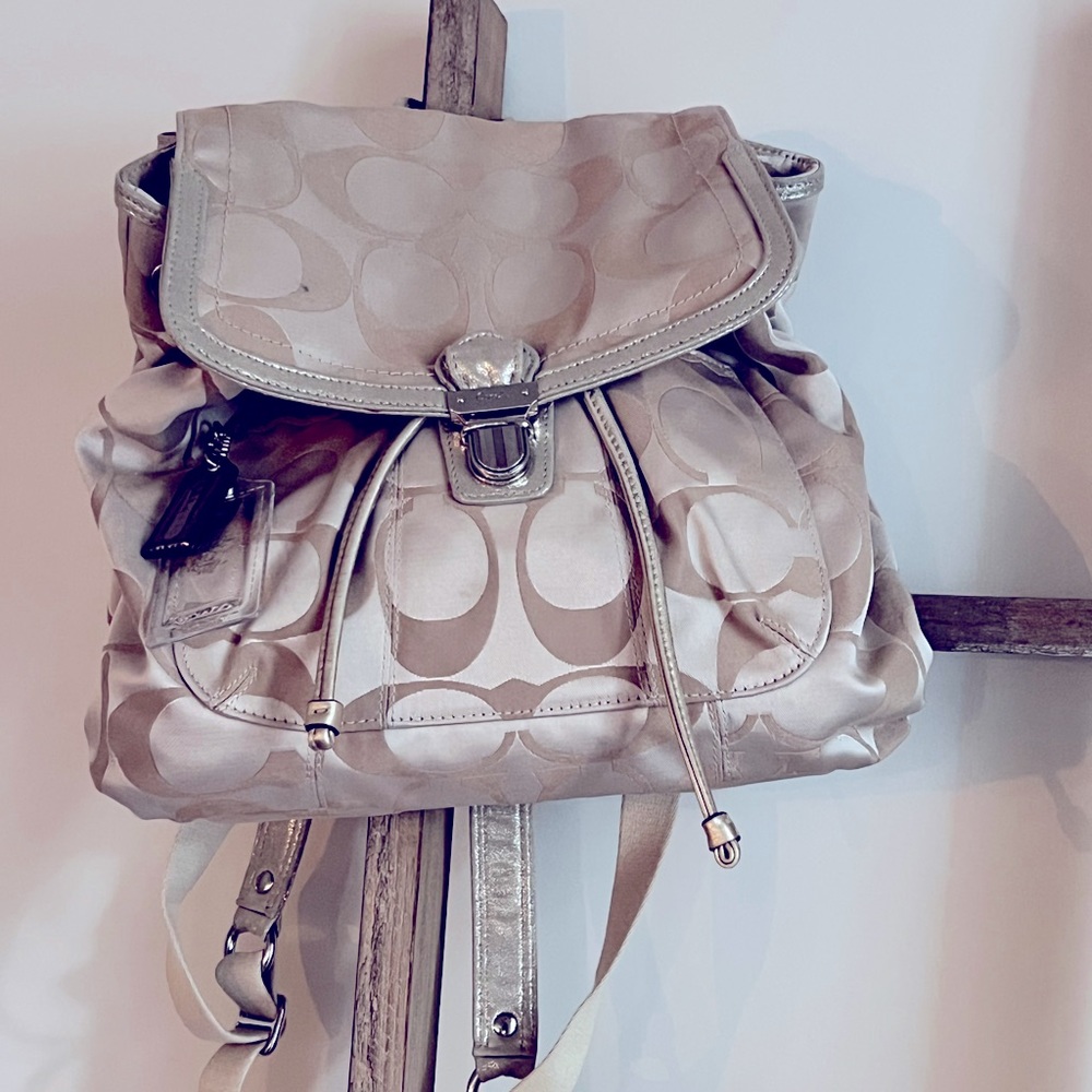 COPY - LIKE NEW: COACH Signature Poppy Collection. Gold & Silver Backpack